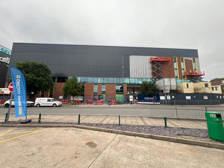 Queensbury brick slips being installed.jpg